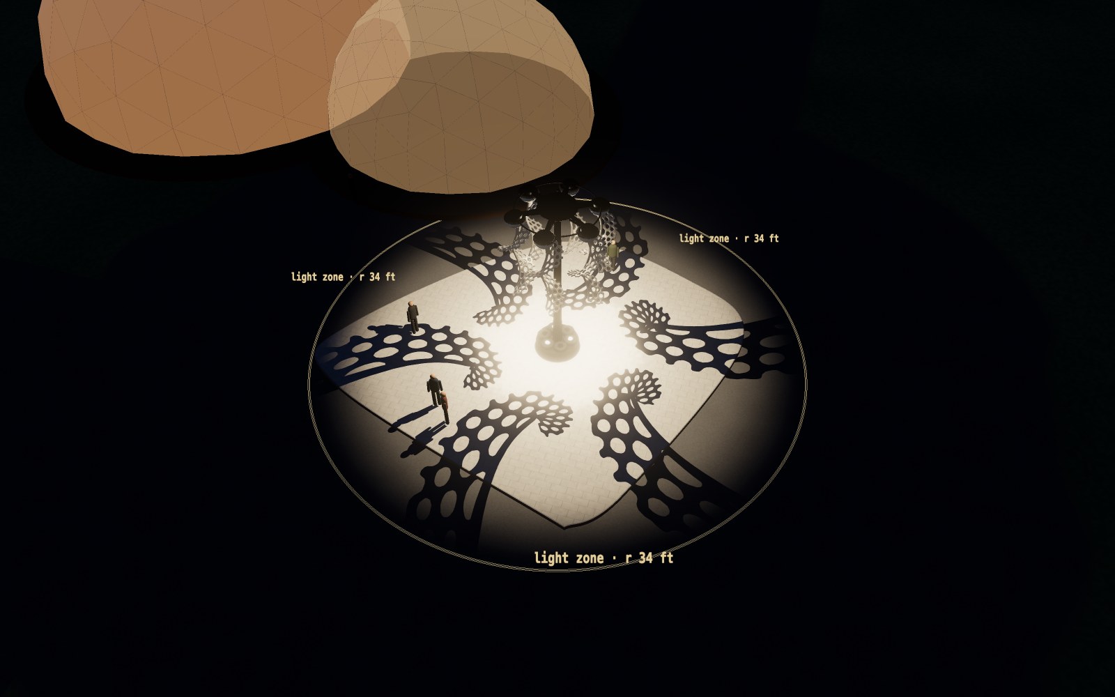 Night view from above: the shadow patterns stay inside the marked light zone, dark beyond it