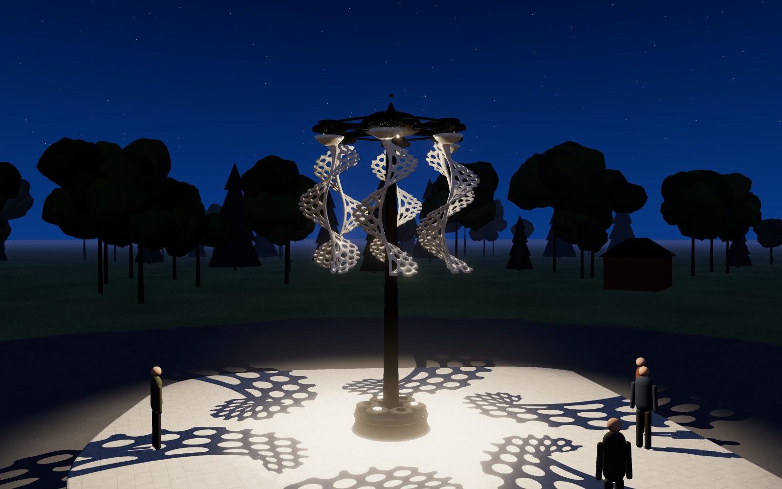 Guests under the sculpture at dusk